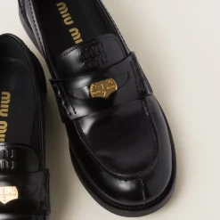 Black Brushed Leather Penny Loafers | Miu Miu