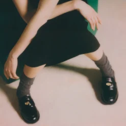 Black Brushed Leather Penny Loafers | Miu Miu