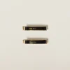 Black Enameled Metal Hair Clips | Miu Miu