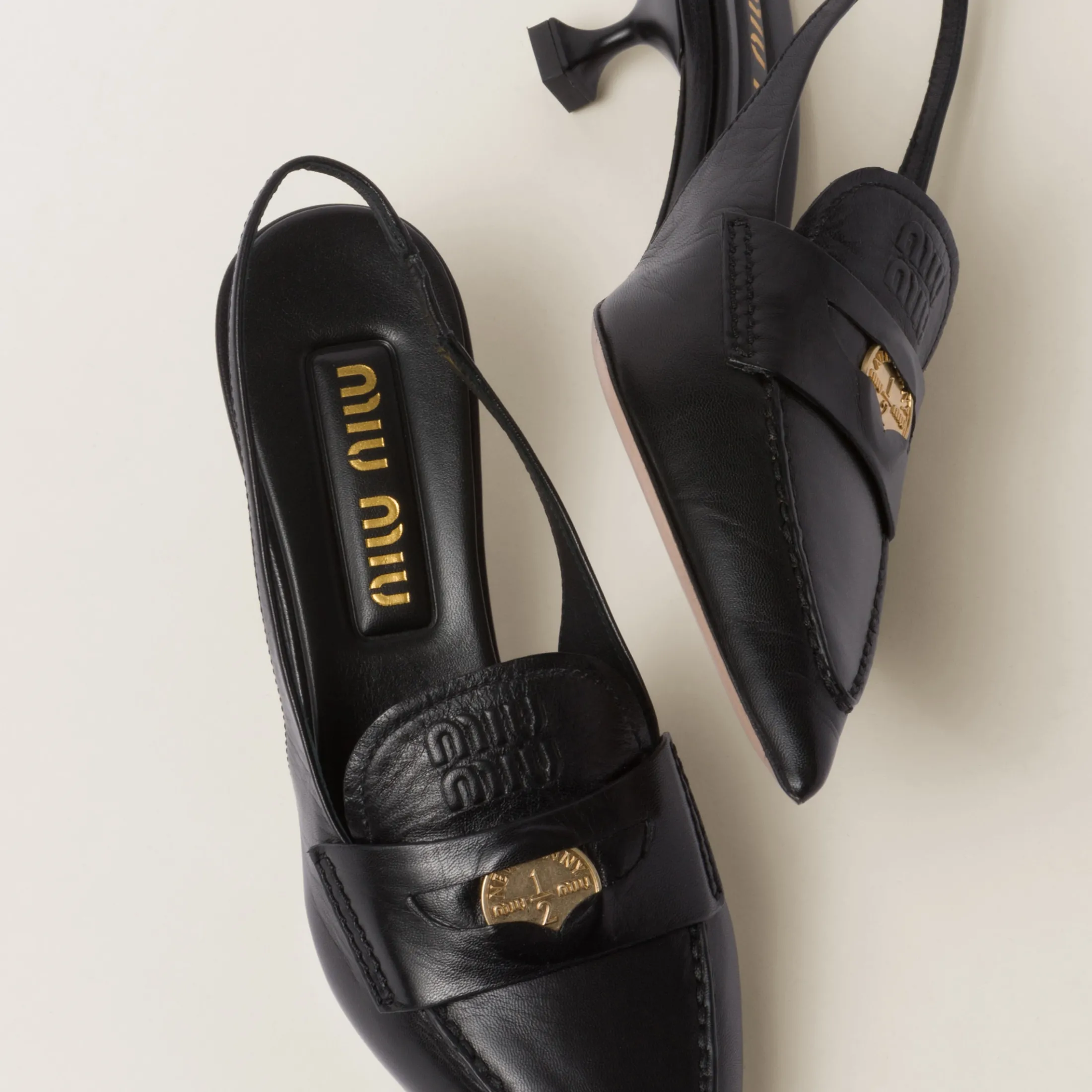Black Leather Penny Loafers With Heel | Miu Miu