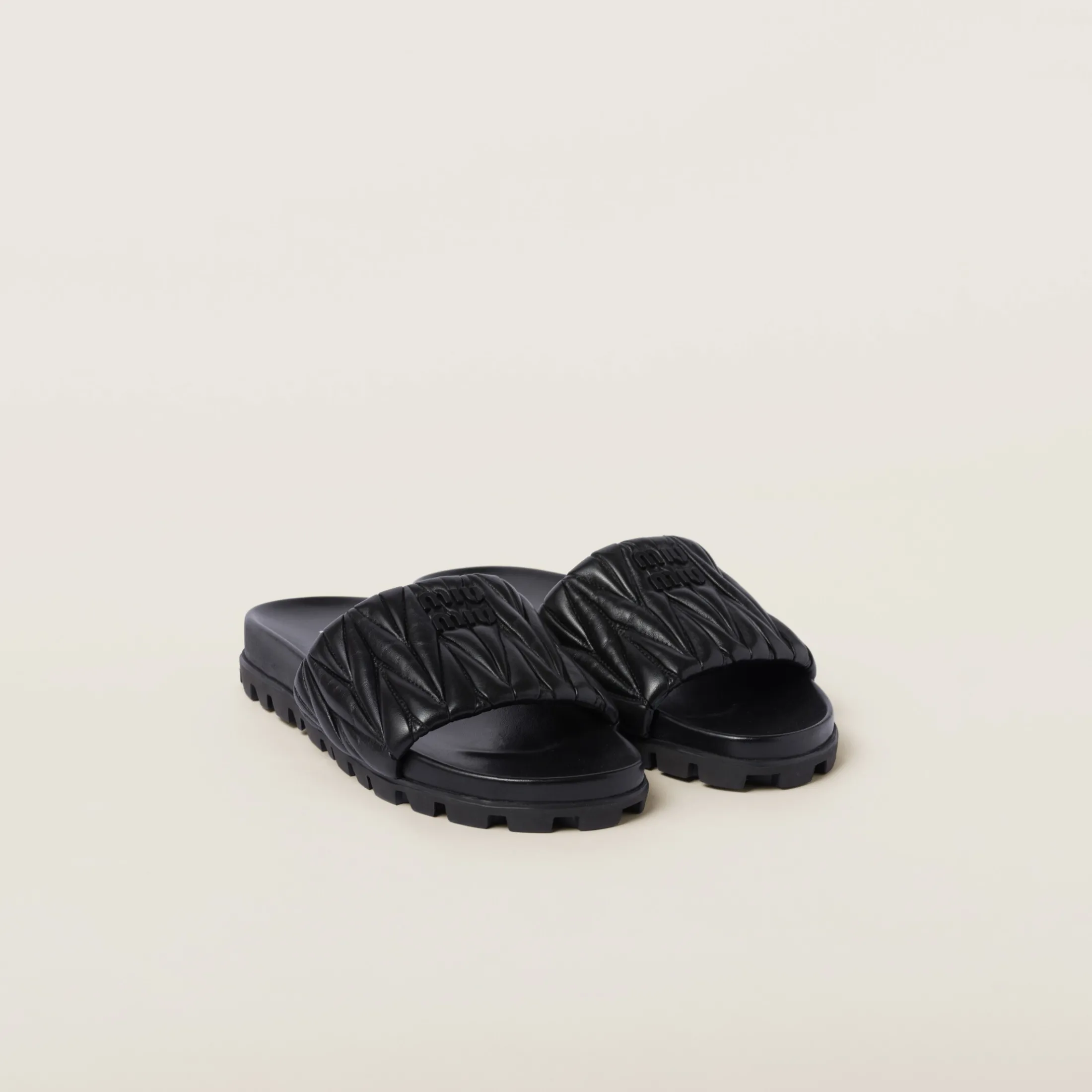 Black Matelassé Nappa Leather Slides | Miu Miu