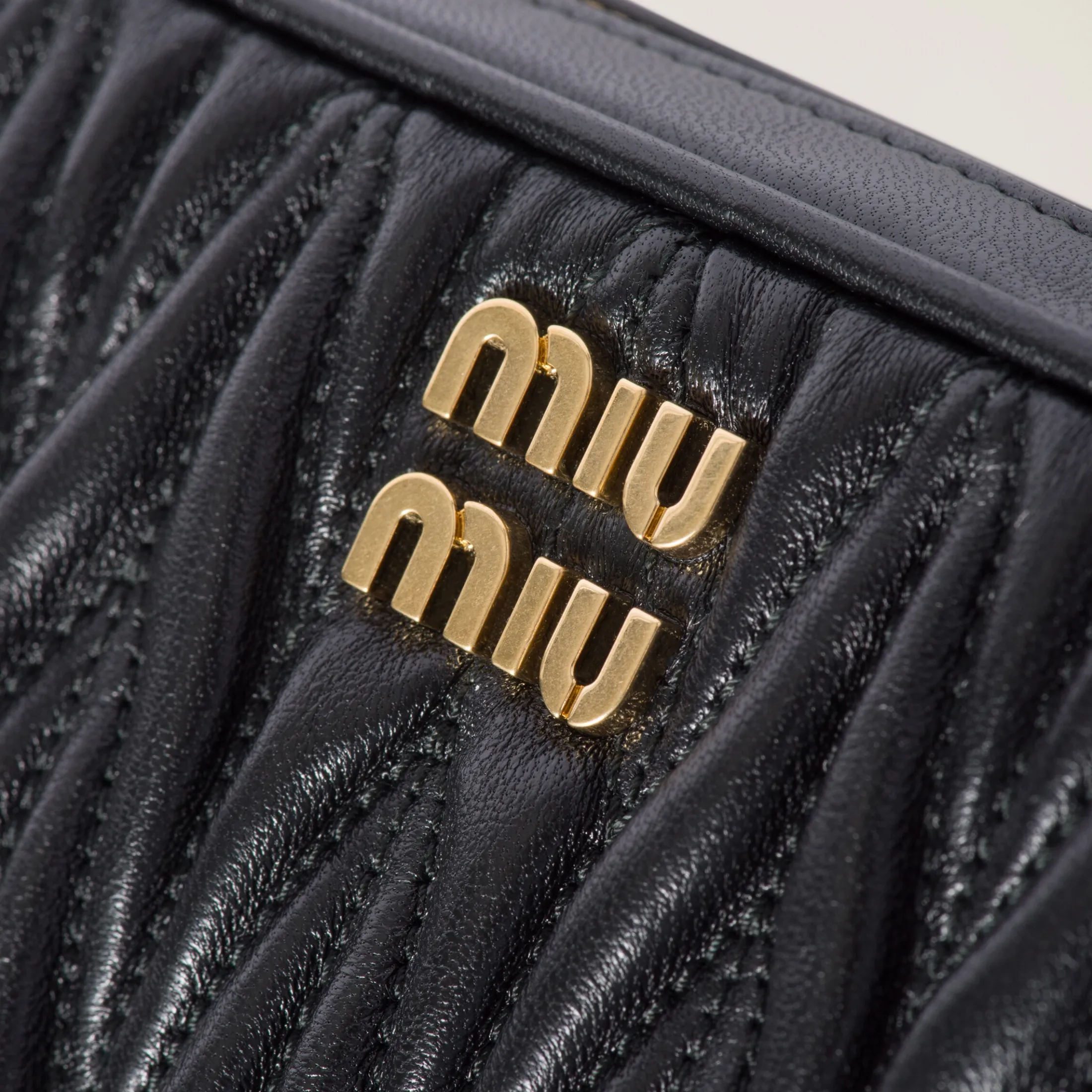 Black Matelassé Nappa Leather Pouch | Miu Miu