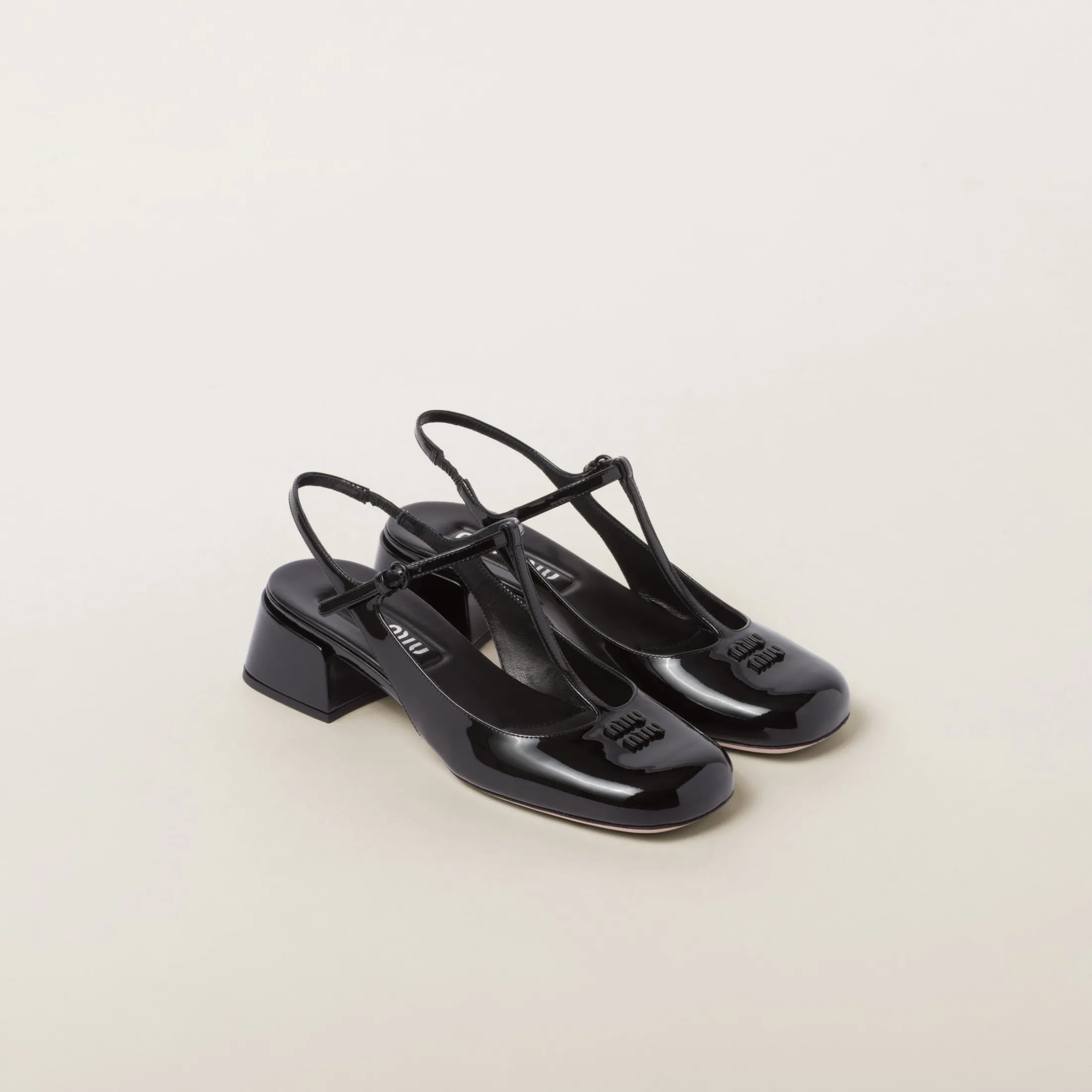 Black Patent Leather Slingback Pumps | Miu Miu