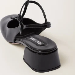 Black Patent Leather Slingback Pumps | Miu Miu