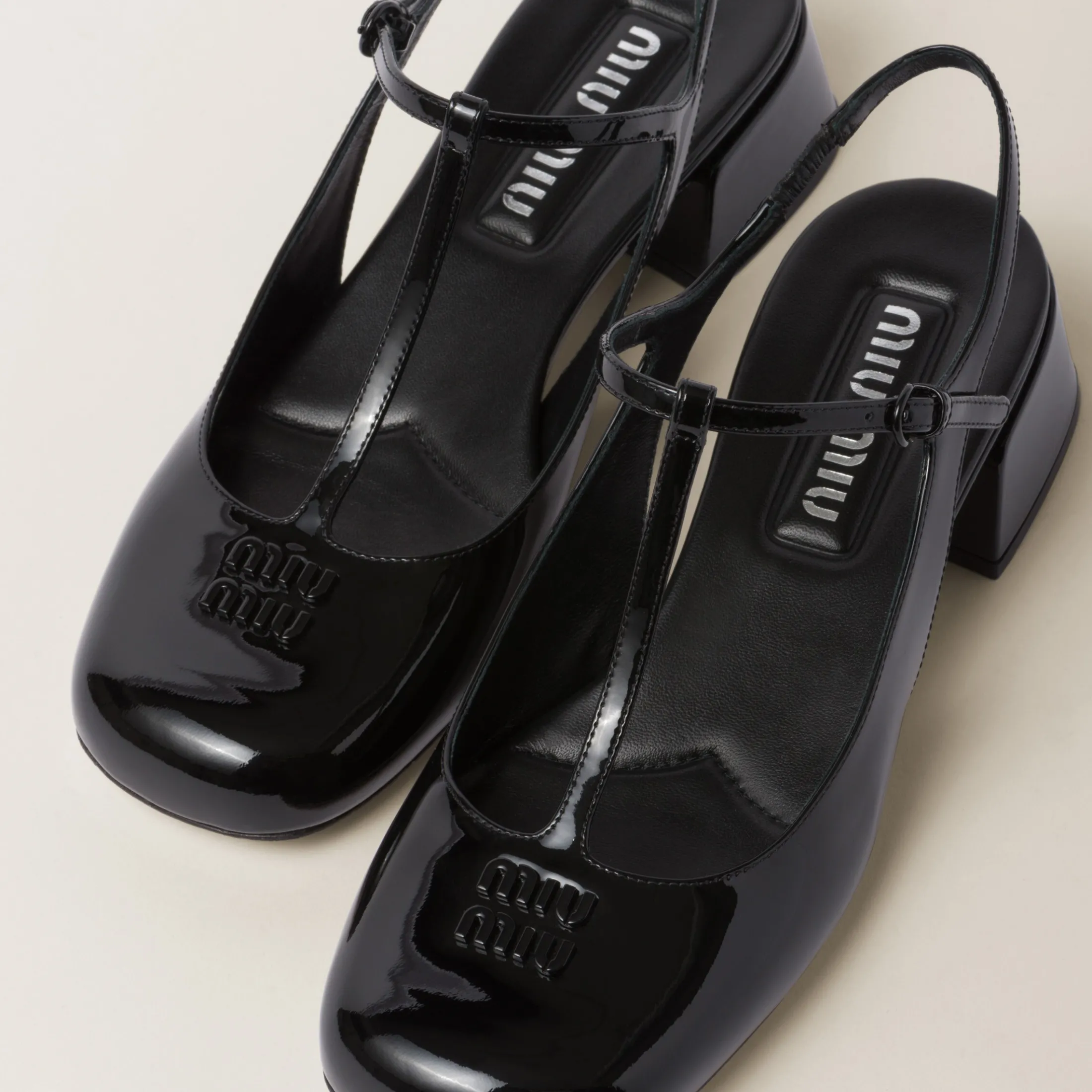 Black Patent Leather Slingback Pumps | Miu Miu