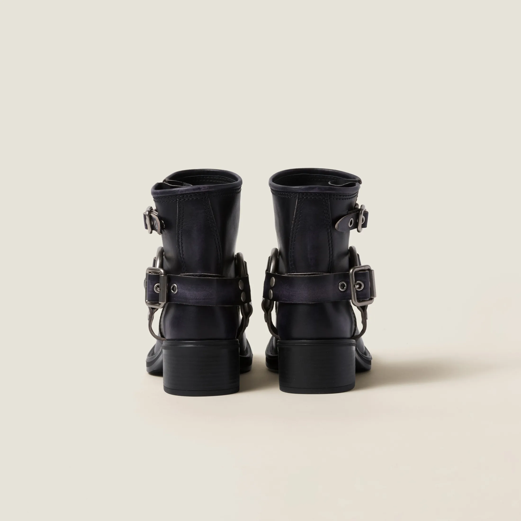 Black Vintage-look Leather Booties | Miu Miu