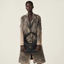 Black Wander Matelassé Nappa Leather Hobo Bag | Miu Miu