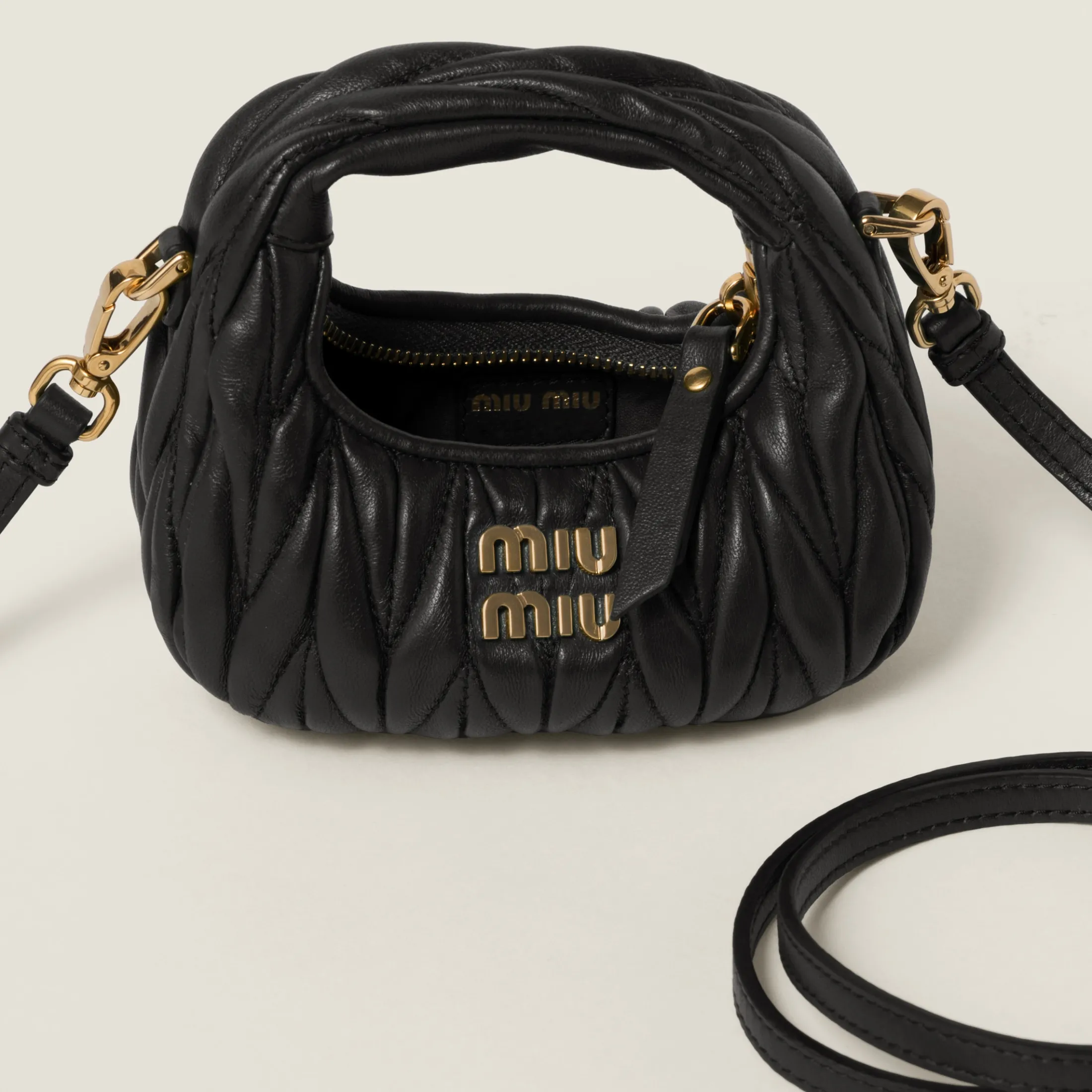Black Wander Matelassé Nappa Leather Micro Hobo Bag | Miu Miu