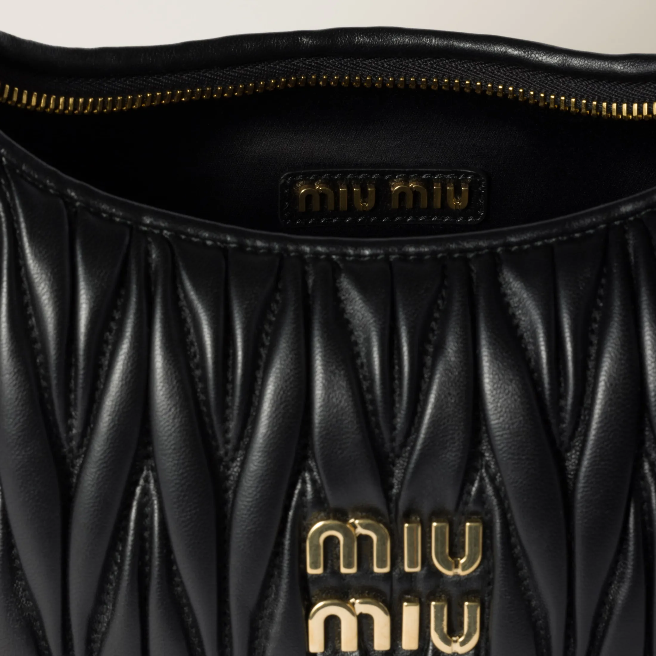 Black Wander Matelassé Nappa Leather Hobo Bag | Miu Miu