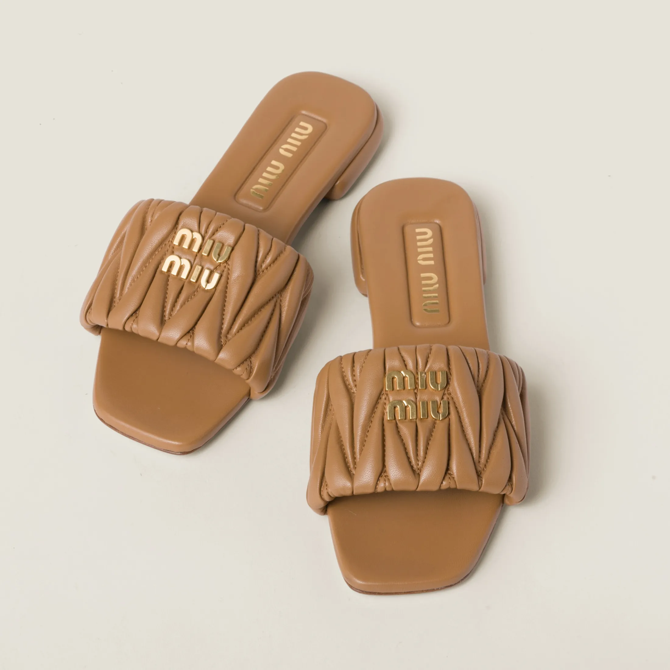 Caramel Matelassé Nappa Leather Slides | Miu Miu