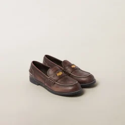 Ebony Vintage-effect Leather Penny Loafers | Miu Miu