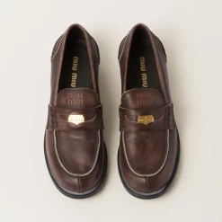 Ebony Vintage-effect Leather Penny Loafers | Miu Miu