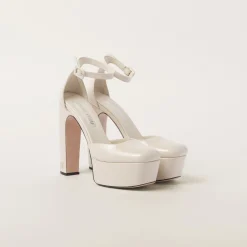 Ivory Patent Leather Platform Pumps | Miu Miu
