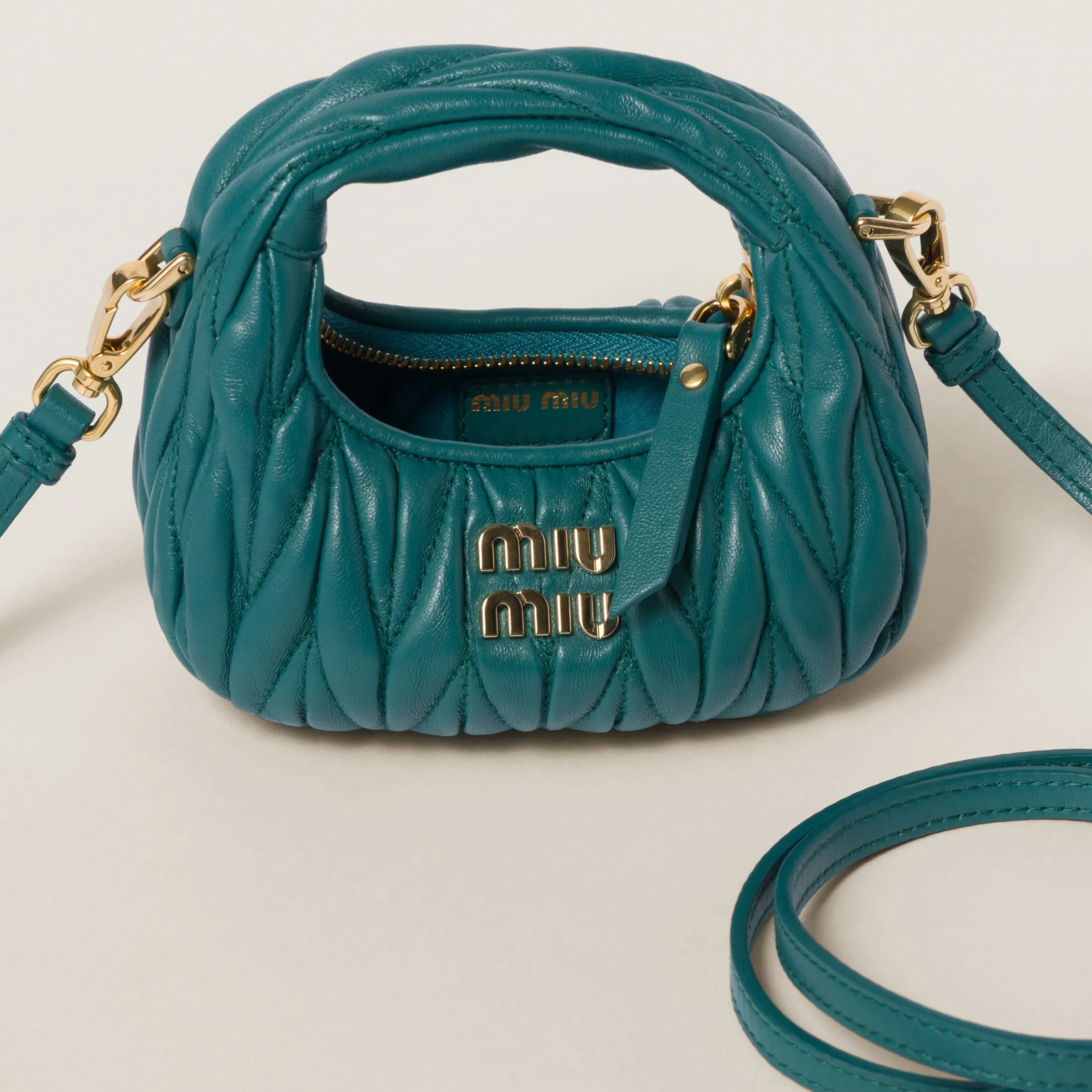 Lagoon Blue Wander Matelassé Nappa Leather Micro Hobo Bag | Miu Miu