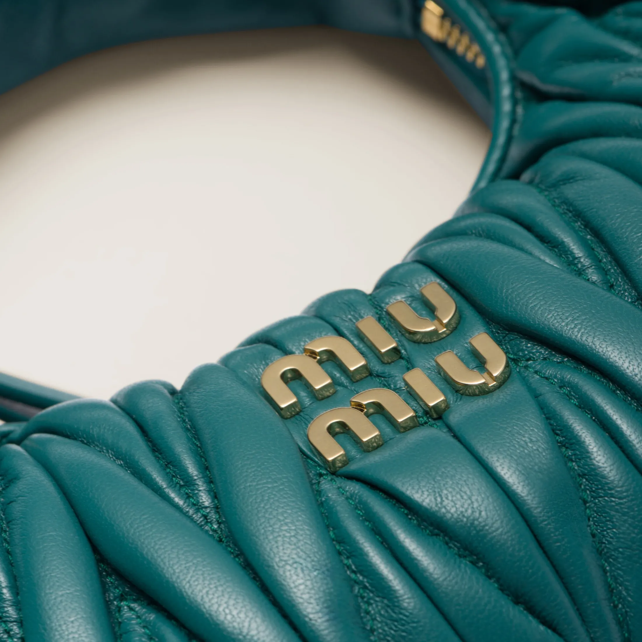 Lagoon Blue Wander Matelassé Nappa Leather Hobo Mini-bag | Miu Miu