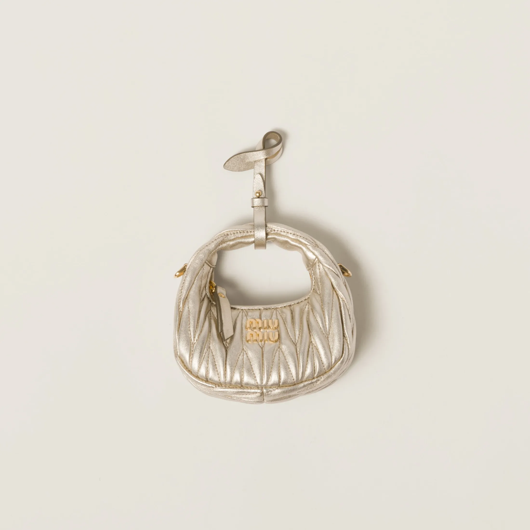 Pyrite Wander Matelassé Nappa Leather Micro Hobo Bag | Miu Miu