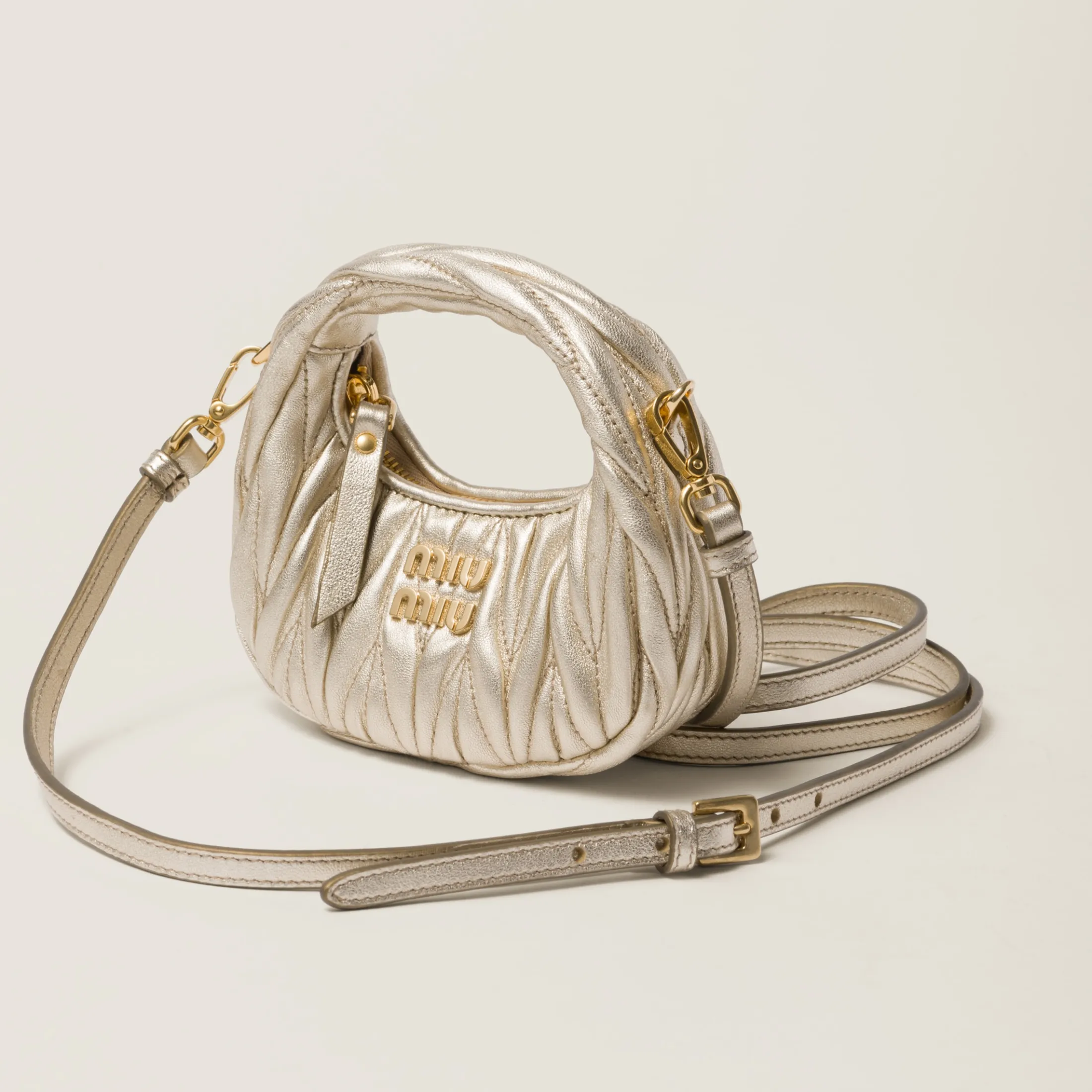 Pyrite Wander Matelassé Nappa Leather Micro Hobo Bag | Miu Miu