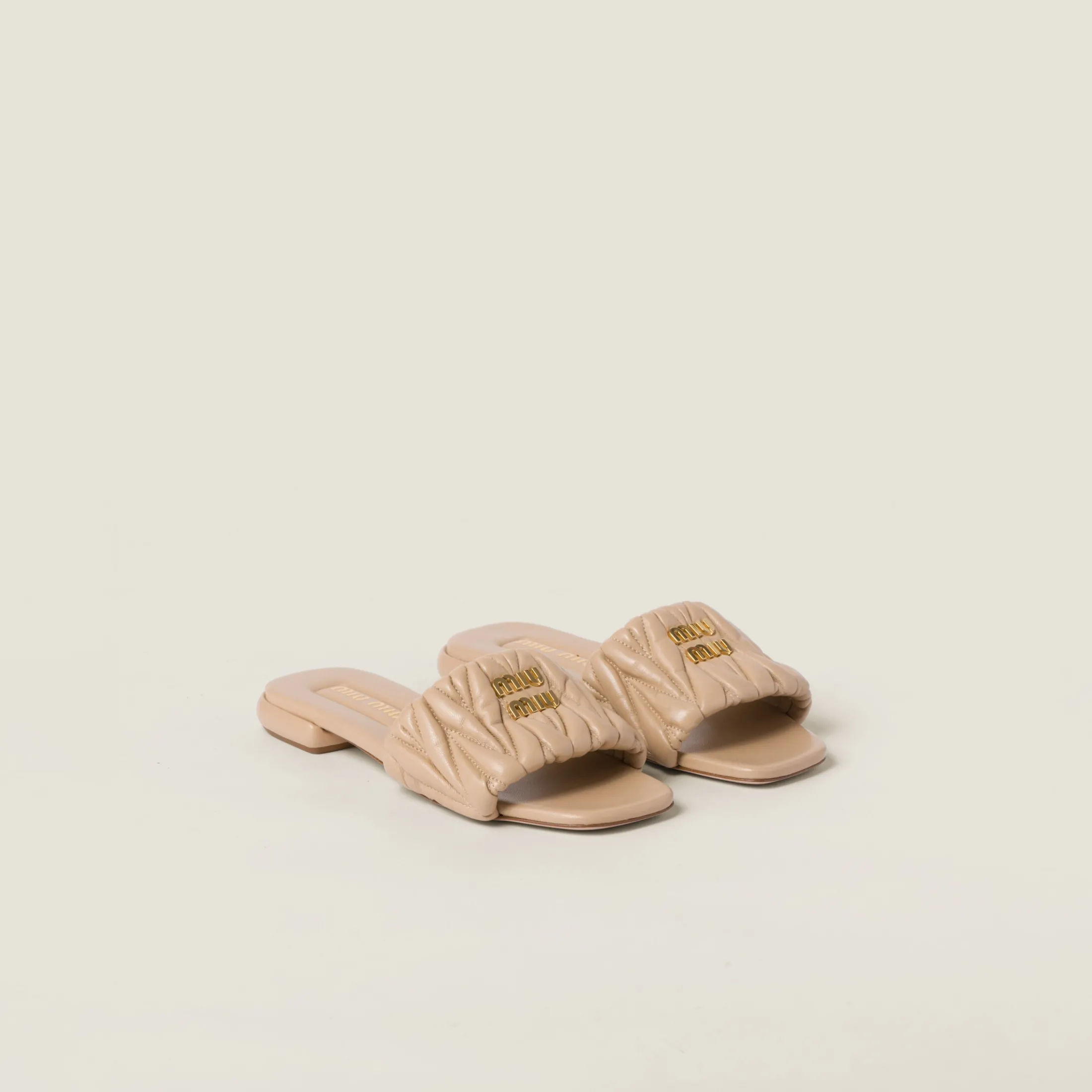 Sand Beige Matelassé Nappa Leather Slides | Miu Miu