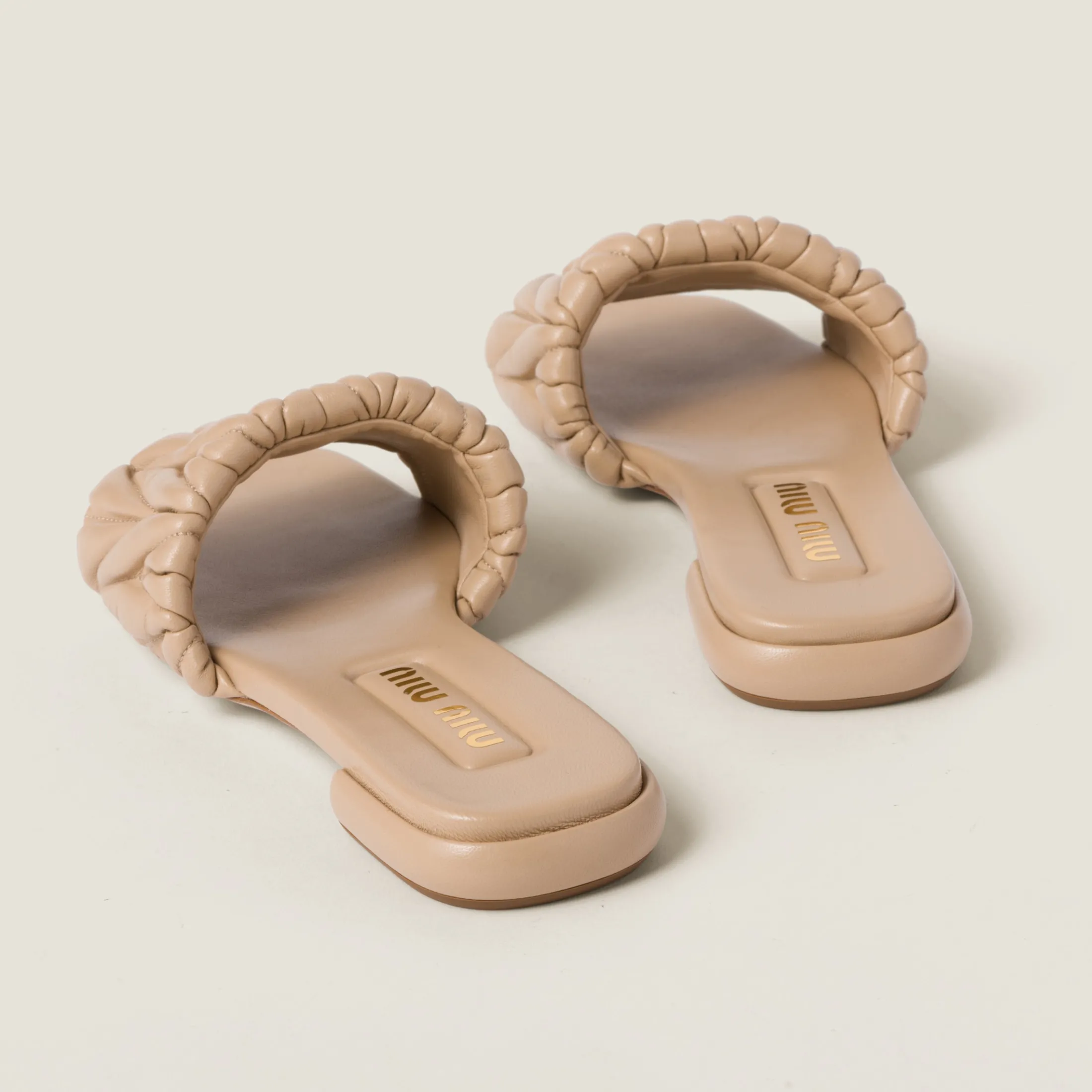 Sand Beige Matelassé Nappa Leather Slides | Miu Miu