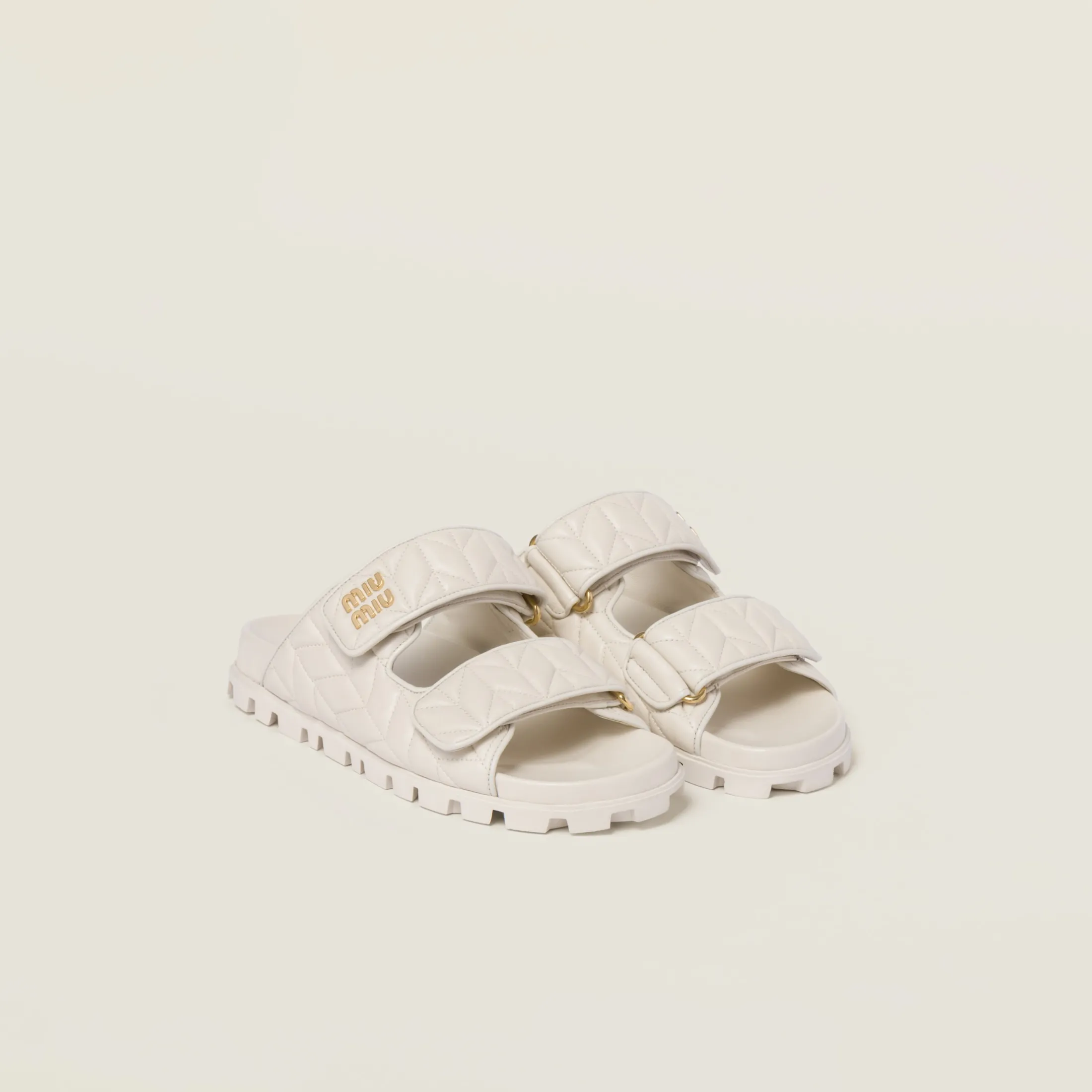 White Matelassé Nappa Leather Slides | Miu Miu