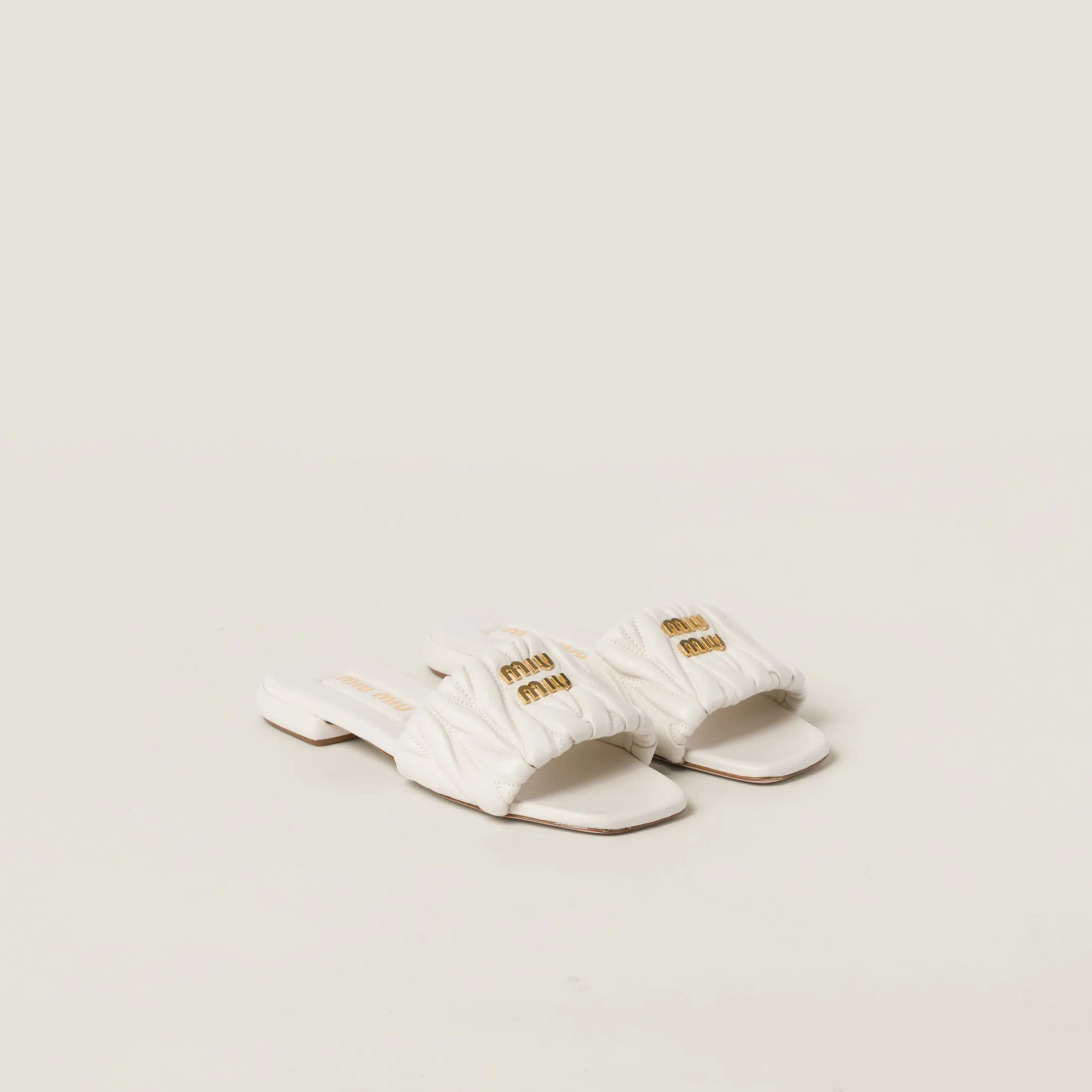 White Matelassé Nappa Leather Slides | Miu Miu