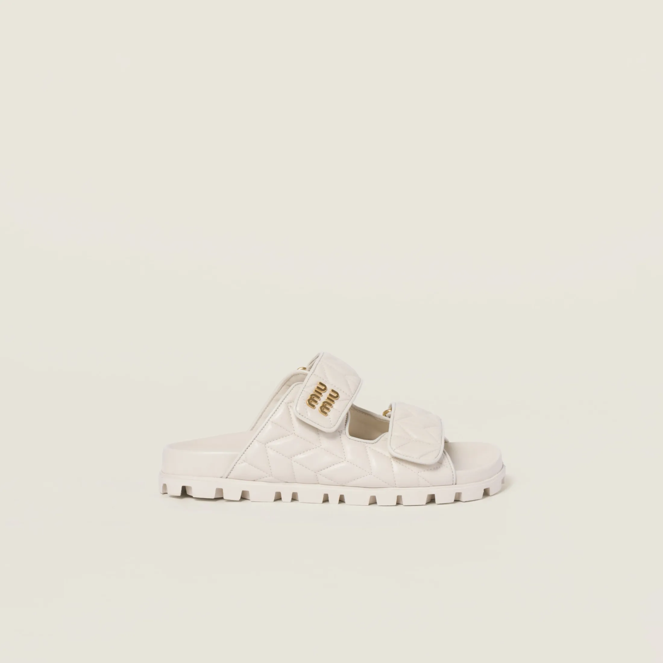 White Matelassé Nappa Leather Slides | Miu Miu