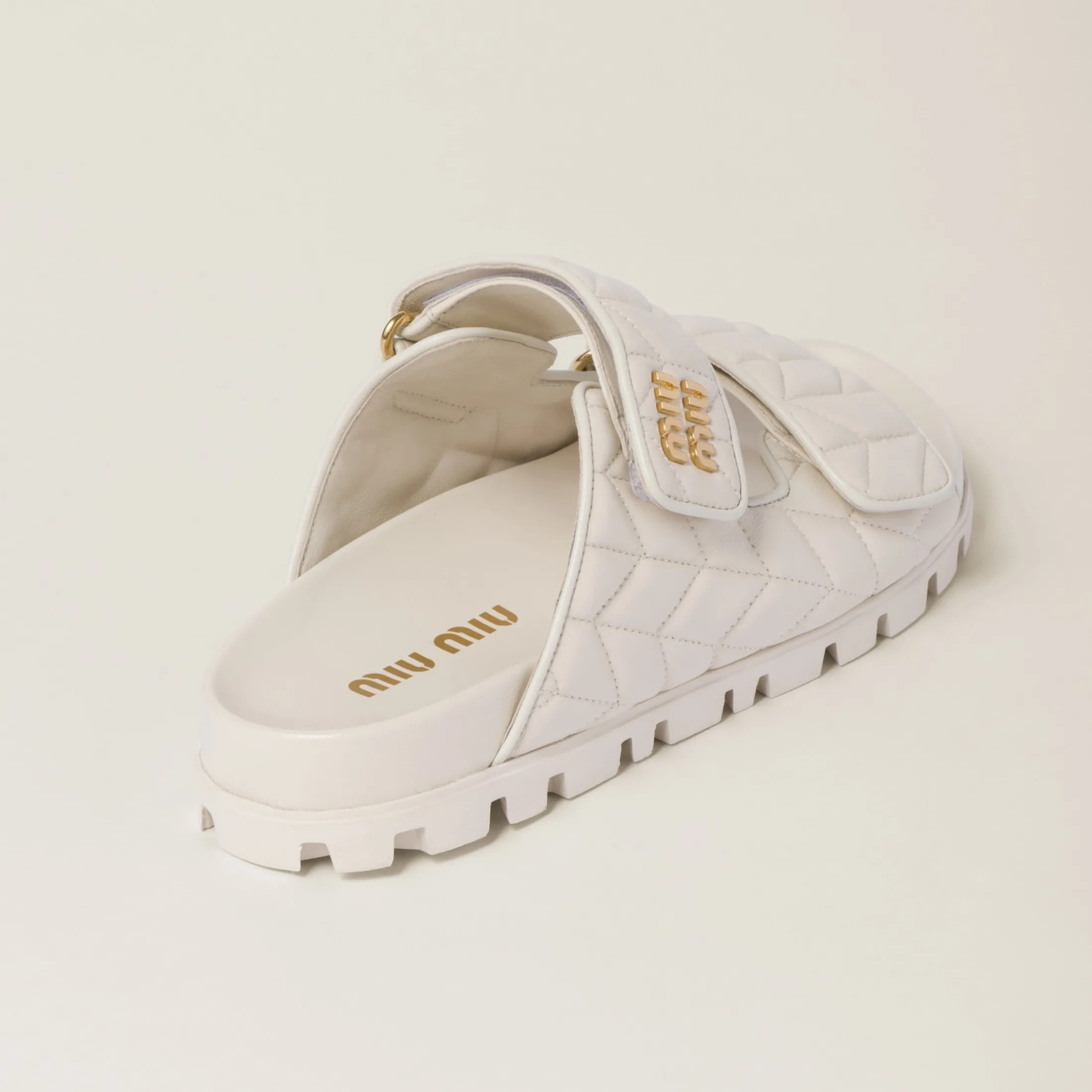 White Matelassé Nappa Leather Slides | Miu Miu