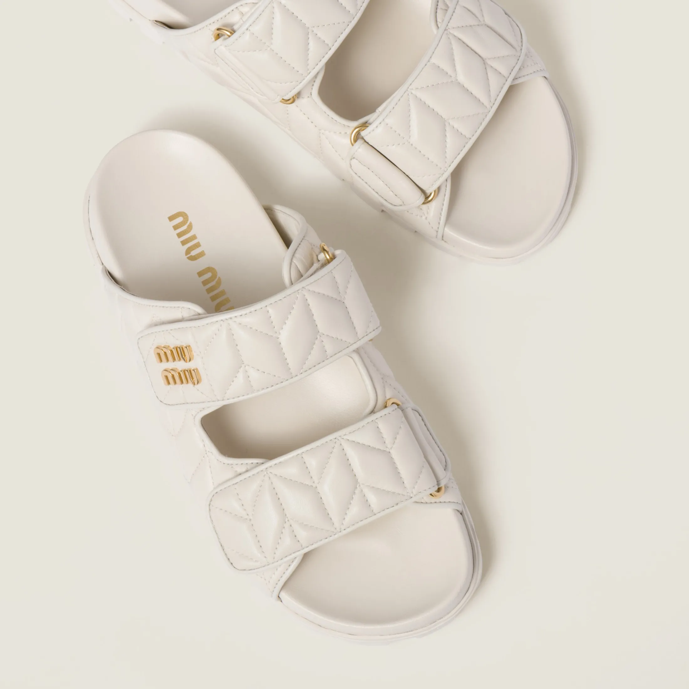 White Matelassé Nappa Leather Slides | Miu Miu