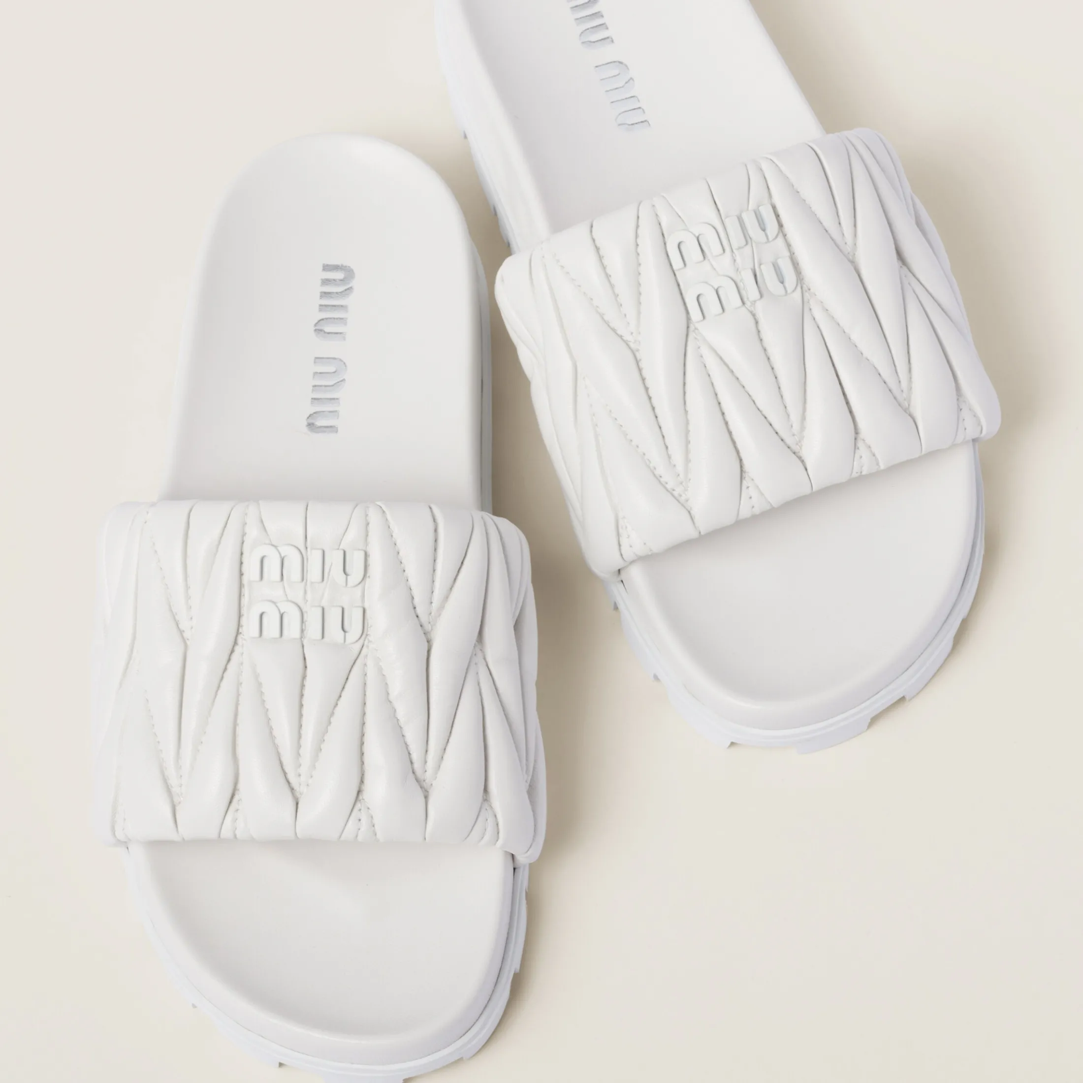 White Matelassé Nappa Leather Slides | Miu Miu